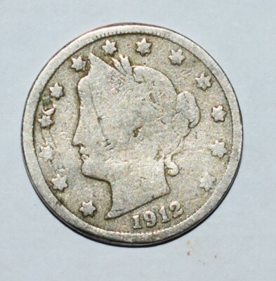 1912 Liberty Head Nickel off-center strike error showing design shift with blank planchet crescent