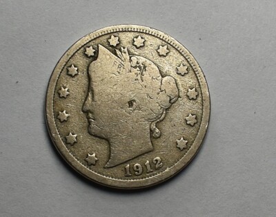 1912 Liberty Head Nickel struck-through error showing flat grease-filled area across Liberty's portrait with sharp surrounding detail