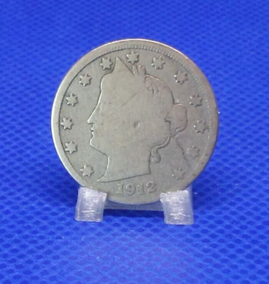 1912 Liberty Head Nickel lamination error showing peeling metal layer with raised blisters and missing patches in coin fields